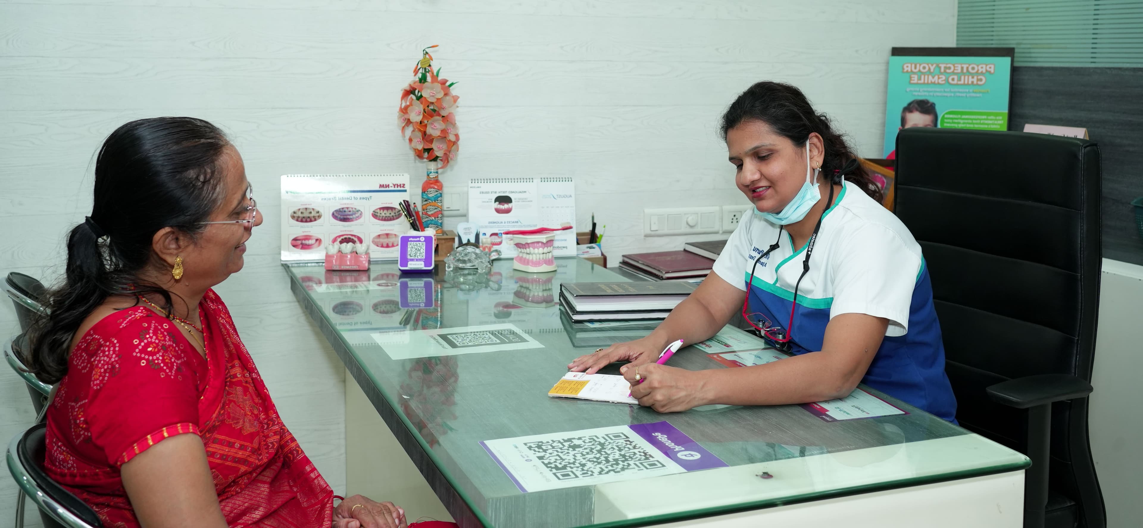 Ajmera Dental Clinic slide 3